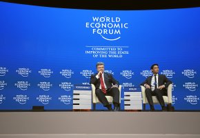 Jolanda Flubacher: DAVOS/SWITZERLAND, 21JAN15 - Petro Poroshenko, President of Ukraine and Philipp Roesler, Head of Centre for Regional Strategies, Member of the Managing Board, World Economic Forum; Young Global Leader are captured during the plenary session 'The Future of